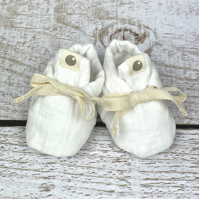 Joli chausson bébé blanc